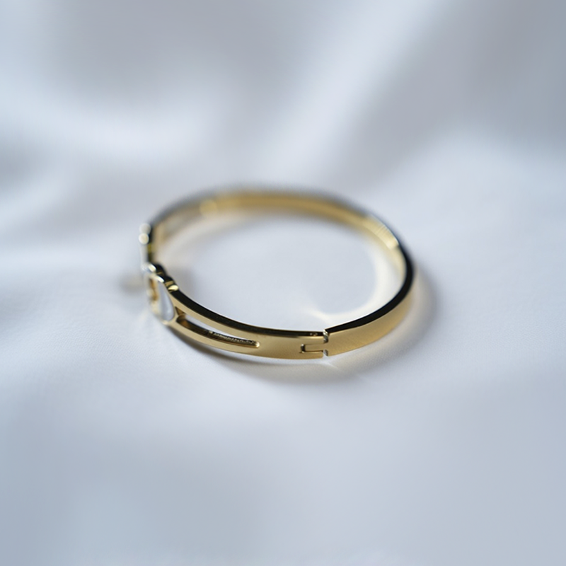 Gold-Plated Stainless Steel Infinity Bracelet With Heart Shapes & Cubic Zirconia Stones