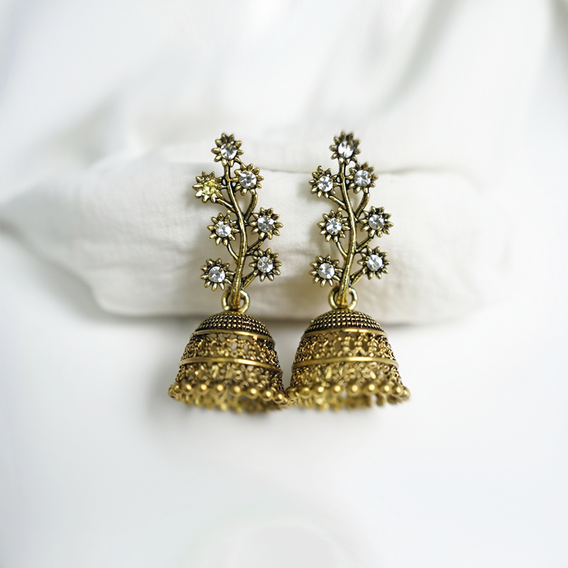 Traditional Antique Gold Toned Floral Studded Jhumka Earrings With Crystal Accents