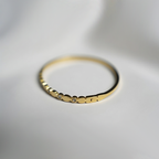 Gold Toned Bangle Style Bracelet With Sparkling Cubic Zirconia Stones In Bezel Dots