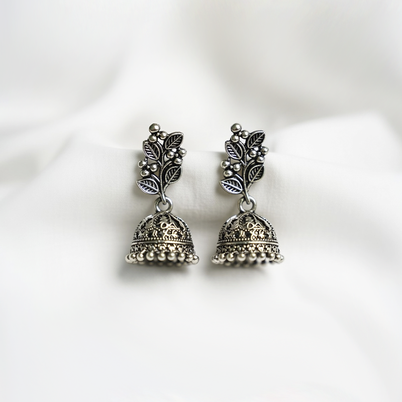 Traditional Oxidized Silver Plated Jhumka Earrings With Floral Leaf Stud Top & a Dome Shaped Drop With Bead Detailing