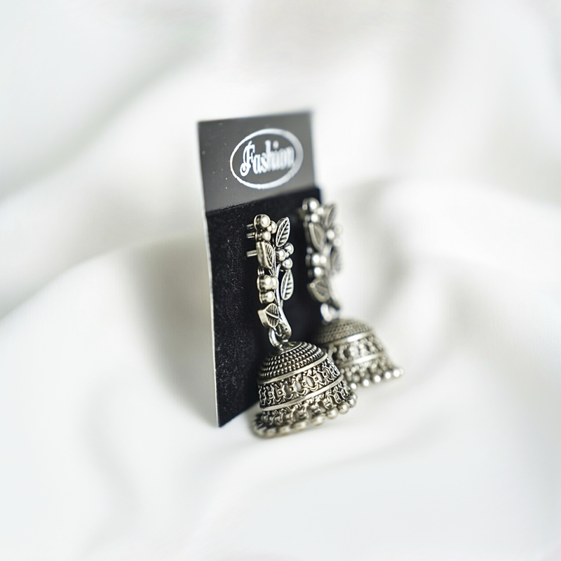 Traditional Oxidized Silver Plated Jhumka Earrings With Floral Leaf Stud Top & a Dome Shaped Drop With Bead Detailing