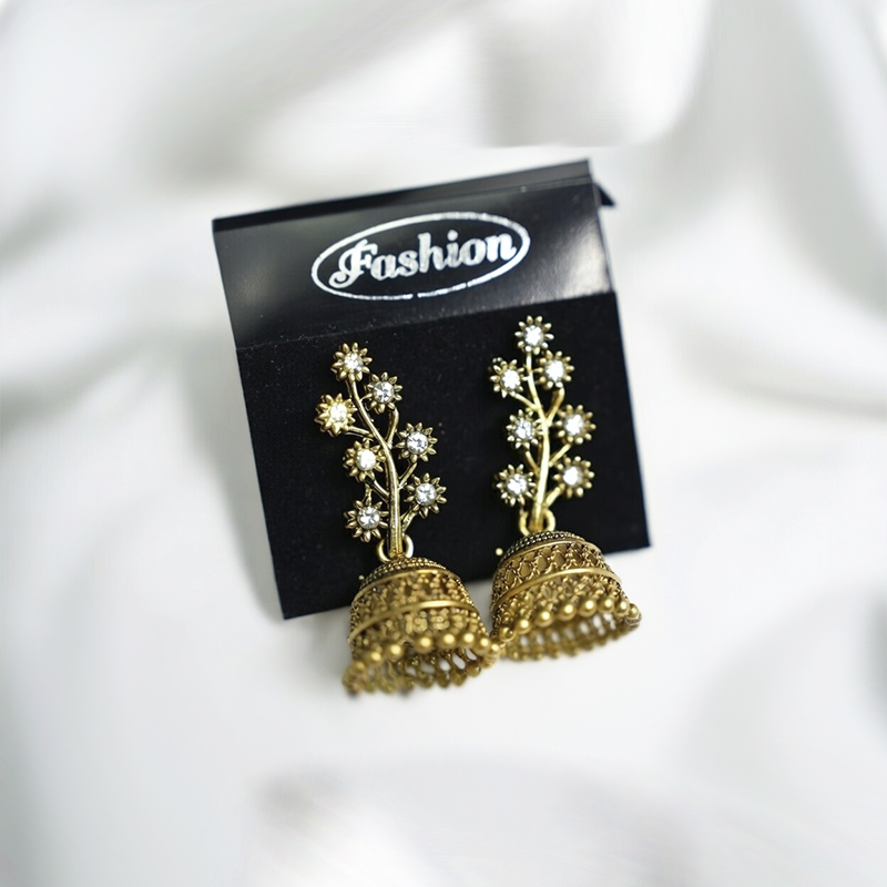 Traditional Antique Gold Toned Floral Studded Jhumka Earrings With Crystal Accents
