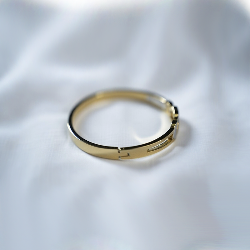 Gold-Plated Stainless Steel Infinity Bracelet With Heart Shapes & Cubic Zirconia Stones